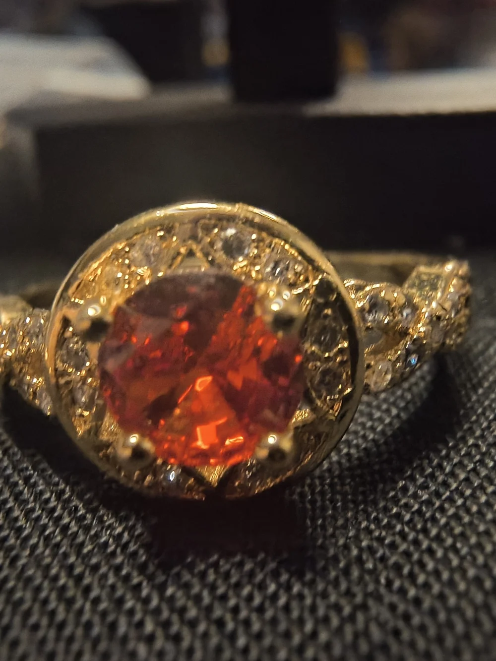 Gold Ring with Red Center Stone and Pavé Accents